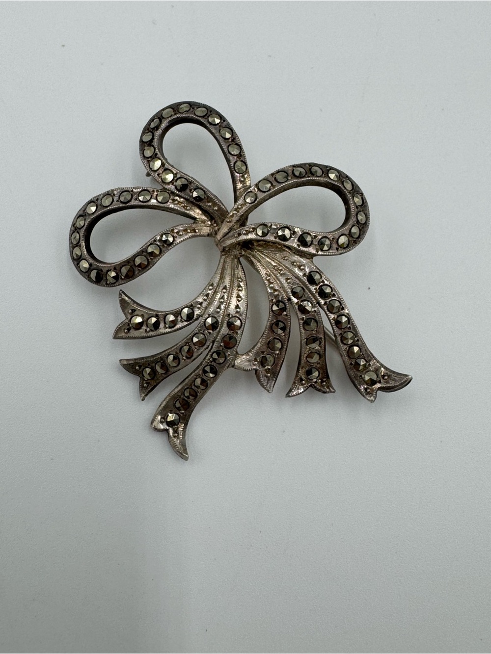 Silver-Tone Marcasite Bow Brooch - Elegant Sparkle